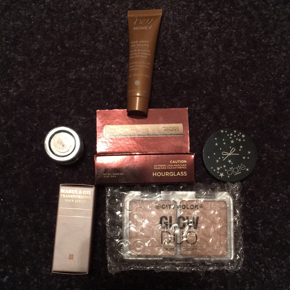 Lot of peel mask, bronzer, mascara, hair oil, etc